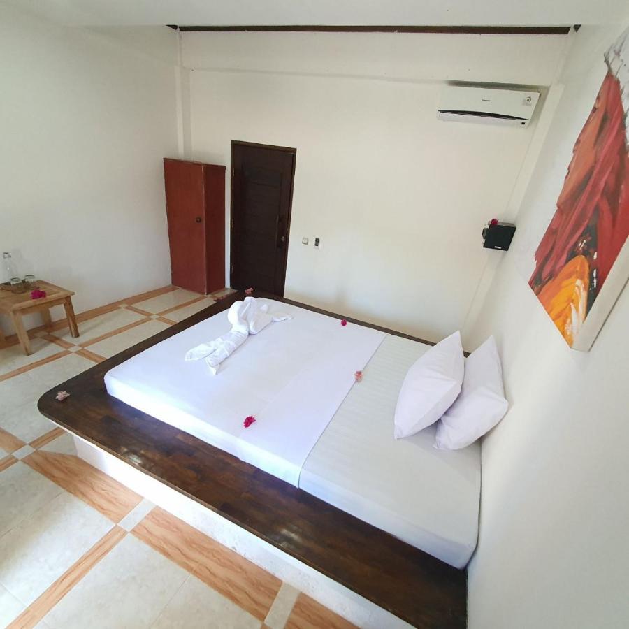 Putra Boyan Cottages Gili Trawangan Exterior photo